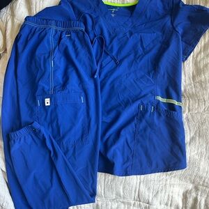 Scrubstar Blue Scrub Top with Green Trim